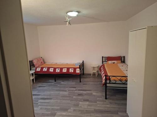Postel nebo postele na pokoji v ubytování Zwei separate Zimmer im 1 OG Ideal für Montüeren oder Studenten WG