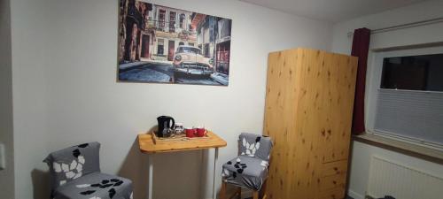 Η κουζίνα ή μικρή κουζίνα στο Gemütliches Gästezimmer in Flensburg-Weiche