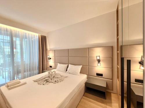 Postel nebo postele na pokoji v ubytování Air Onia