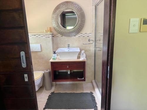 Et badeværelse på 6 Baluwatu, Zimbali Coastal Estate