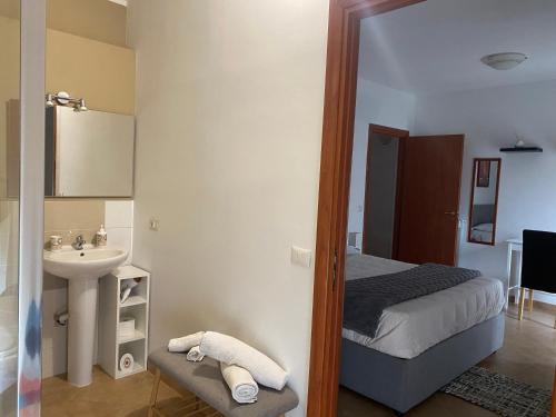 Ένα ή περισσότερα κρεβάτια σε δωμάτιο στο B&B Olimpia