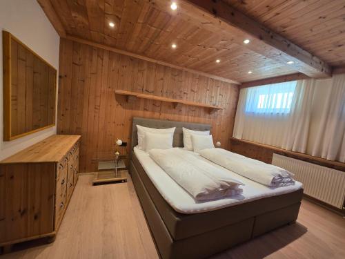 Postel nebo postele na pokoji v ubytování Landhaus Knoflach