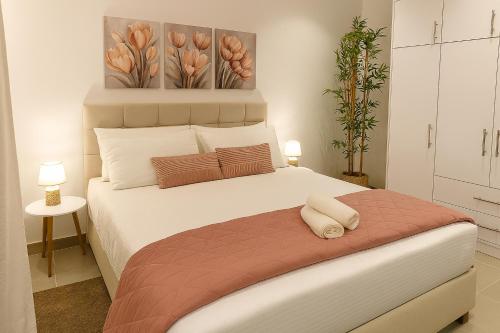 Ένα ή περισσότερα κρεβάτια σε δωμάτιο στο Belvedere Luxury Suite