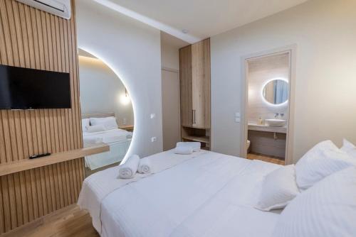 Postel nebo postele na pokoji v ubytování Andre House Trikala