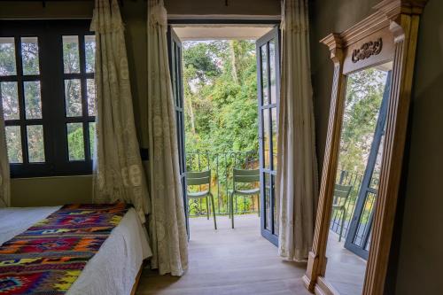 Postel nebo postele na pokoji v ubytování Cabaña Rincón de Piedra