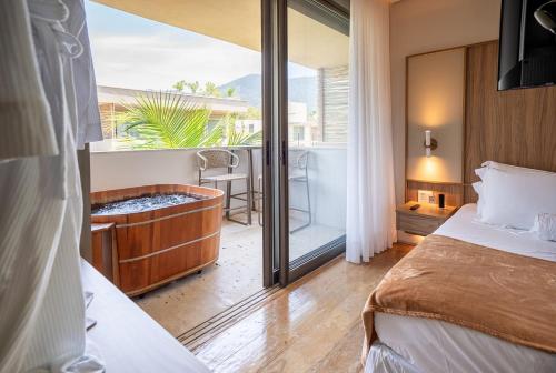 Postel nebo postele na pokoji v ubytování Duke Beach Hotel Maresias