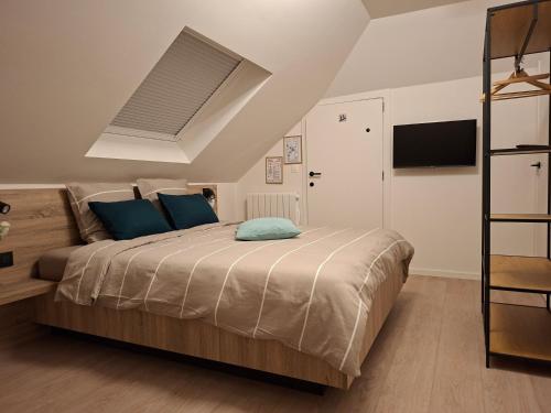 Postel nebo postele na pokoji v ubytování B&B De Scheldeberg