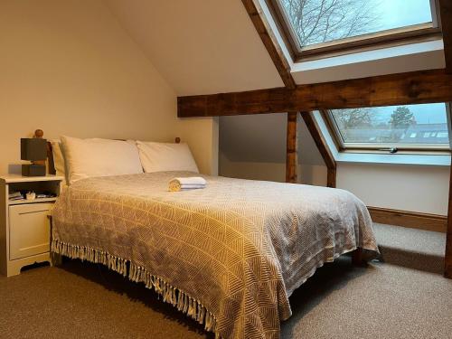 En eller flere senge i et værelse på Spacious Victorian townhouse - Sleeps 11