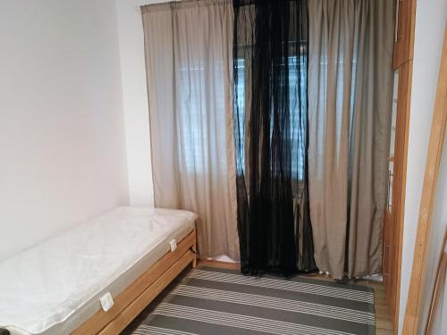 Postel nebo postele na pokoji v ubytování Ana Apartment River Sava