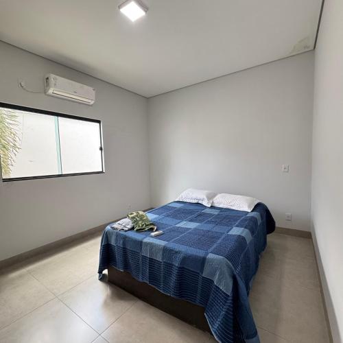 Кровать или кровати в номере lazer e descanso que sua família merece