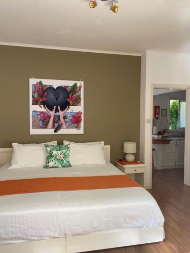 Ένα ή περισσότερα κρεβάτια σε δωμάτιο στο Sunbird Bungalow