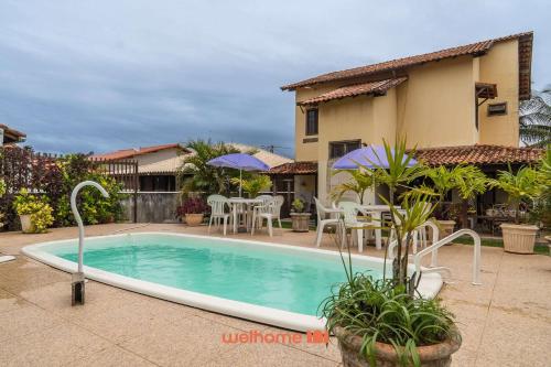 Swimmingpoolen hos eller tæt på Casa em Cabo Frio com Piscina e Acesso a Praia