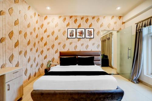 Ένα ή περισσότερα κρεβάτια σε δωμάτιο στο Hotel O DUNARA