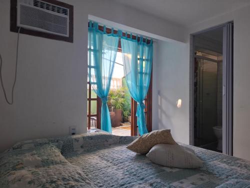 Giường trong phòng chung tại Sal Studio - Centro RJ