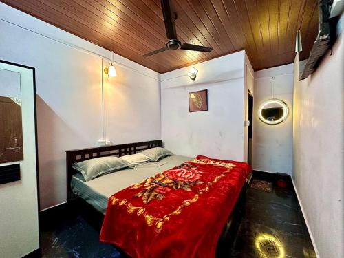 Ένα ή περισσότερα κρεβάτια σε δωμάτιο στο Dream Garden Homestay