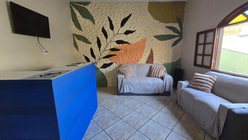 TV a/nebo společenská místnost v ubytování Almar Hospedagem 2 ARRAIAL DO CABO