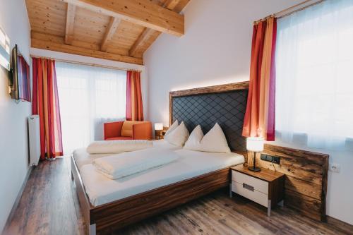 Postel nebo postele na pokoji v ubytování Design-Appartementhaus - Urlaubsresort Hafele