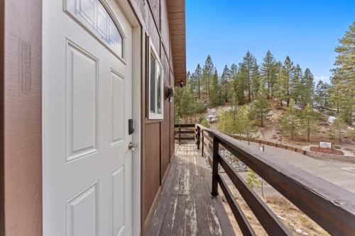 a door to a building with a view of a mountain at HNC0691 - Tramway Treat home in Summit Village
