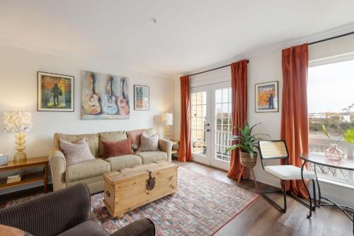 a living room with a couch and a table at Nashville Downtown Condo -788 in Nashville