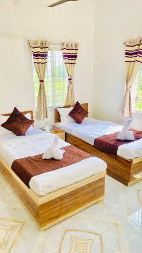 Кровать или кровати в номере The Green Haven Homestay