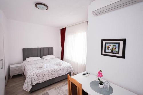 Postel nebo postele na pokoji v ubytování Family Hotel Alex