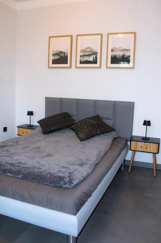 Ένα ή περισσότερα κρεβάτια σε δωμάτιο στο Bergapartment I Netflix I Disney I Bad I Küche