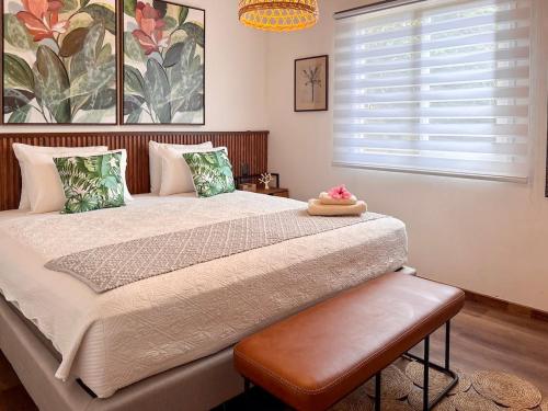 Rúm í herbergi á Hare Mahalo