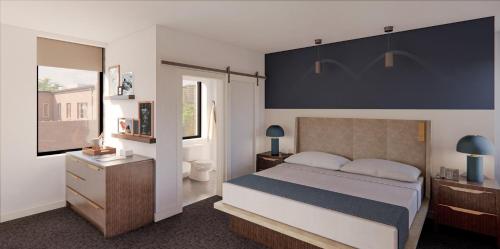 Giường trong phòng chung tại The Lantern Hotel Columbia