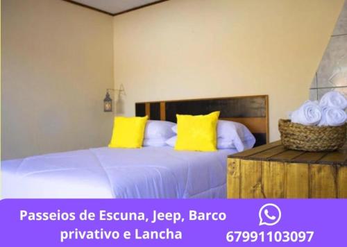 Giường trong phòng chung tại Pousada Bougain Ville Para-tí