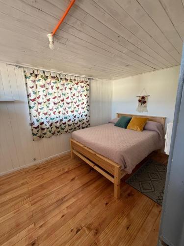 Ένα ή περισσότερα κρεβάτια σε δωμάτιο στο Hostal Route 5