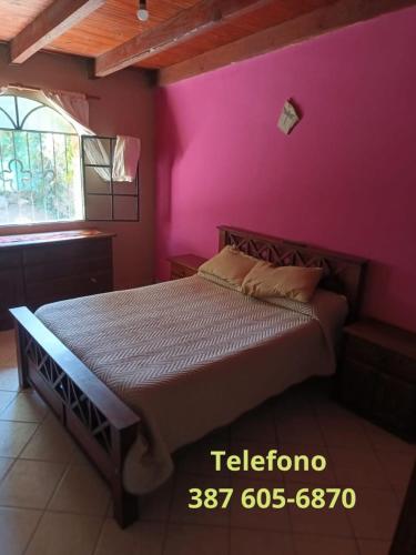 Postel nebo postele na pokoji v ubytování La Pachita