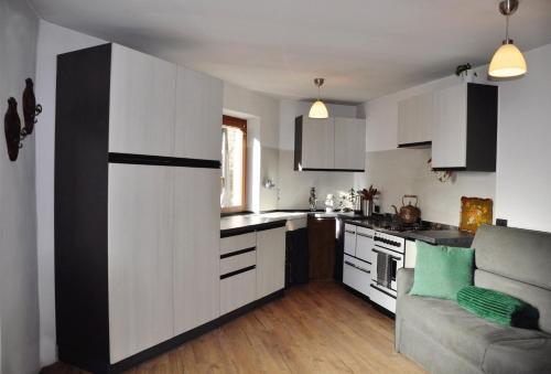 Køkken eller tekøkken på Casa Vacanze Carano - El Me Tabià