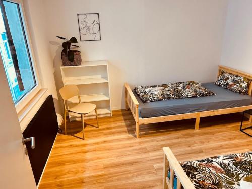 Ένα ή περισσότερα κρεβάτια σε δωμάτιο στο Odw homes - small cozy old town apartment