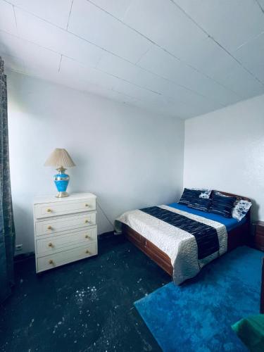 Postel nebo postele na pokoji v ubytování Jnelis Home