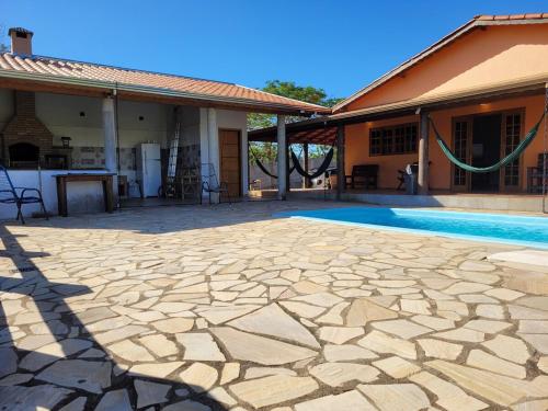 Het zwembad bij of vlak bij Chácara Recanto Colibri