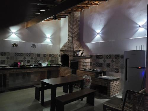 Een keuken of kitchenette bij Chácara Recanto Colibri