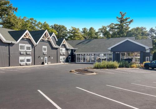 a large parking lot in front of a building at The Vic By Kasa in Traverse City