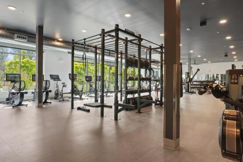 a gym with a lot of treadmills and machines at Kasa On The River Boise in Boise