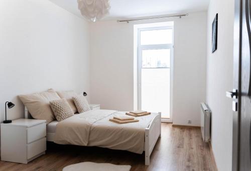 Postel nebo postele na pokoji v ubytování Tatry view apartment