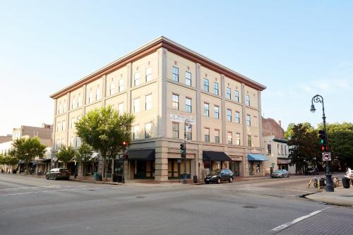 a large building on a city street with a street at Kasa Altmayer Savannah in Savannah