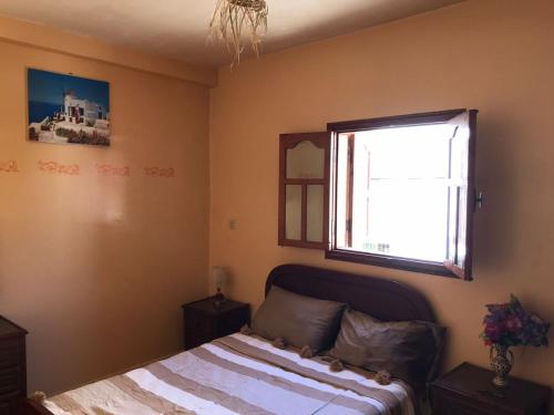 Ένα ή περισσότερα κρεβάτια σε δωμάτιο στο LoveWave House