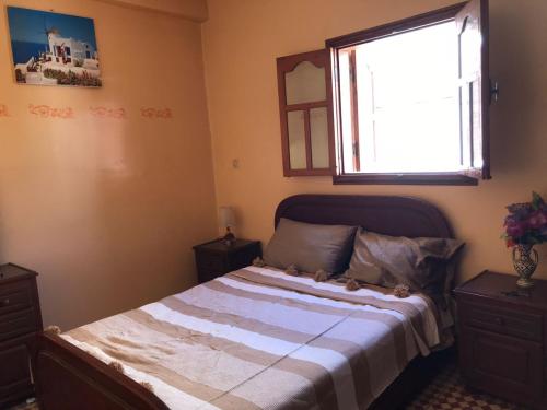 Postel nebo postele na pokoji v ubytování LoveWave House