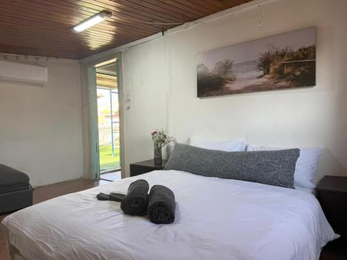 Ένα ή περισσότερα κρεβάτια σε δωμάτιο στο Rooftop flat in Jerusalem