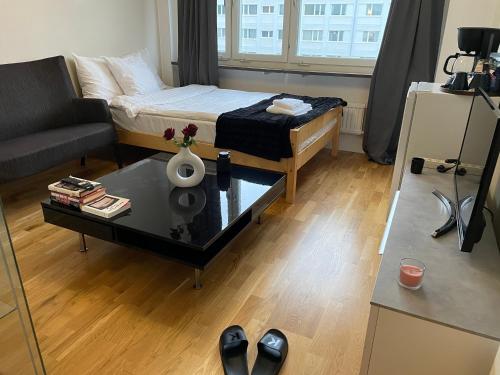 Ένα ή περισσότερα κρεβάτια σε δωμάτιο στο Cozy Private Room in Uppsala