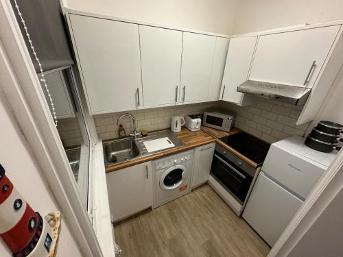 Кухня или мини-кухня в Apartment Masons Hill
