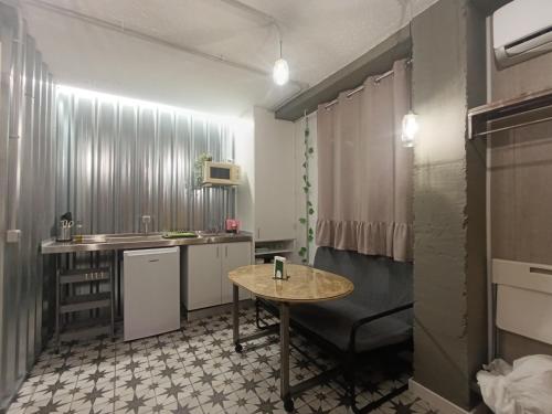 Η κουζίνα ή μικρή κουζίνα στο "El Rincón de Sevilla IV" A 9 min en metro del centro de Sevilla