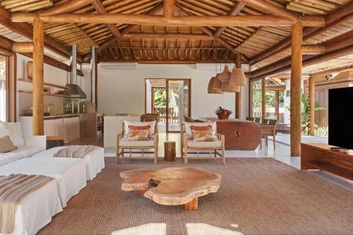 Ένα ή περισσότερα κρεβάτια σε δωμάτιο στο Casa Guariní - Algodões Beach, Peninsula de Maraú, Bahia