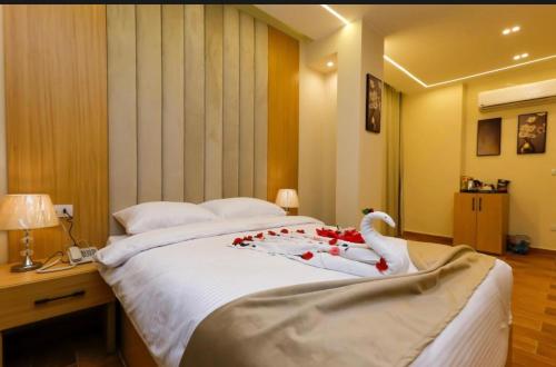 Кровать или кровати в номере Lyra Pyramids Inn