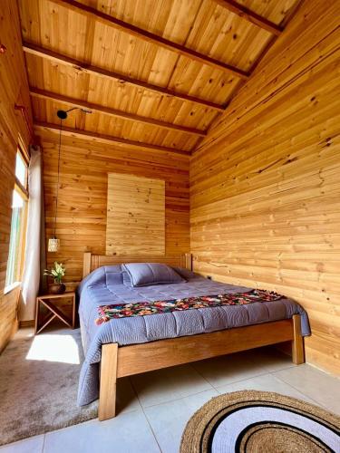 Ένα ή περισσότερα κρεβάτια σε δωμάτιο στο Cabaña La Yegüera