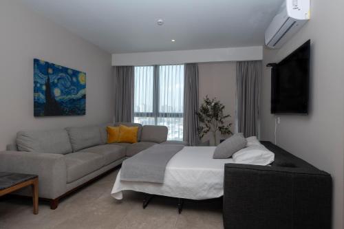 Ένα ή περισσότερα κρεβάτια σε δωμάτιο στο Luxury and Comfort in Gaudalajara 10 minutes away from Expo Guadalajara